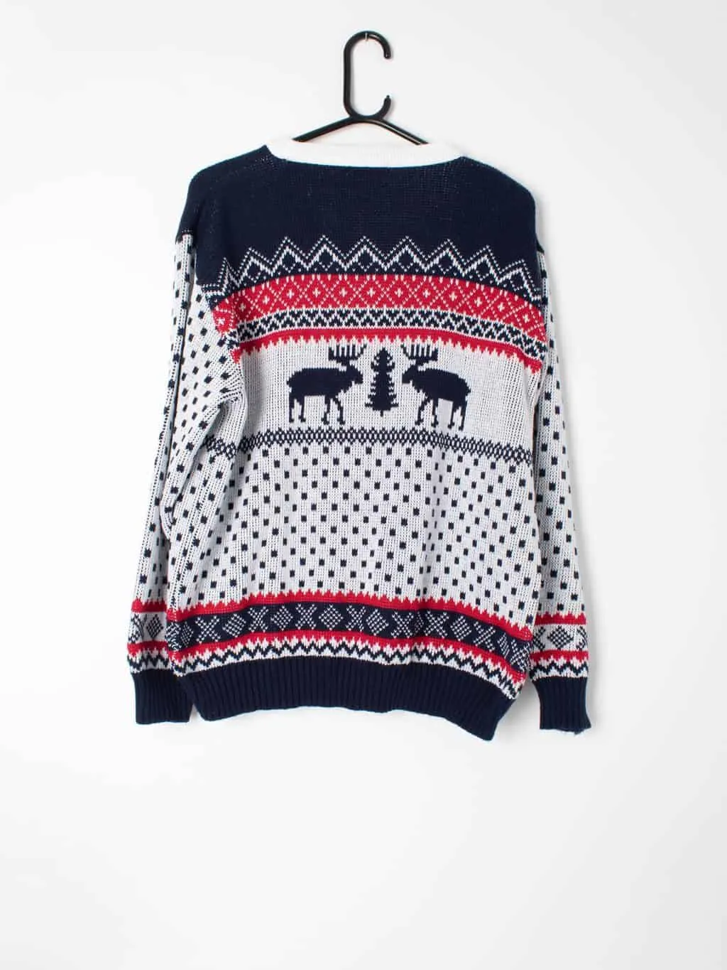 Unisex 1980s-style Christmas novelty jumper with abstract reindeer pattern – M / L